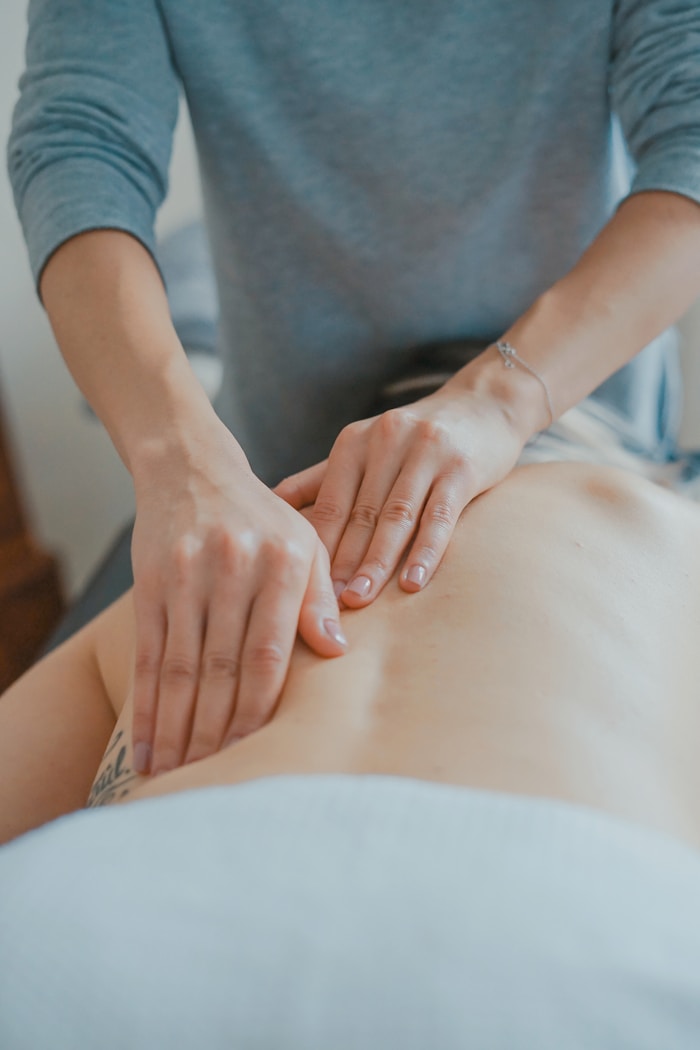 Serene massage therapy environment with warm lighting